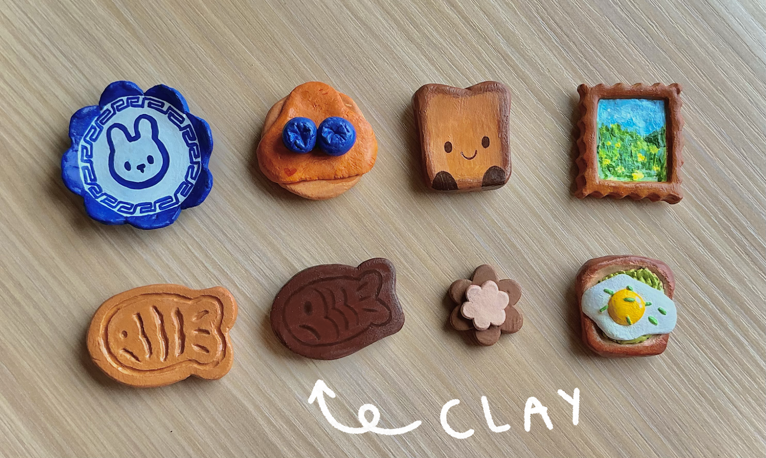Clay magnets resembling breakfast foods