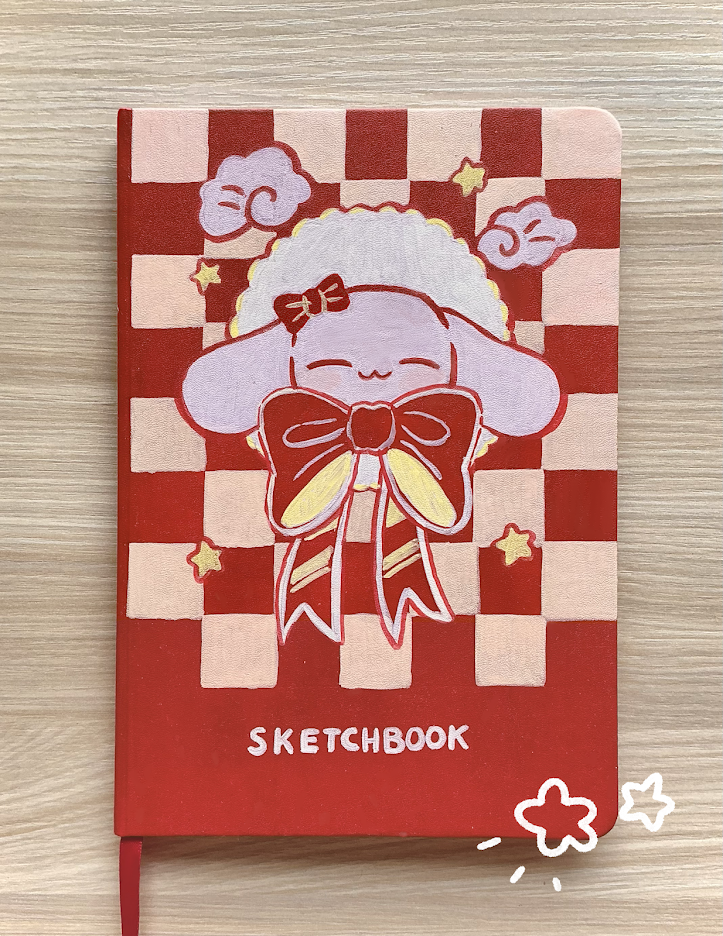 Red sketchbook decorated with Cinnamonroll painting